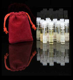eight aromam perfume samples in small bottles